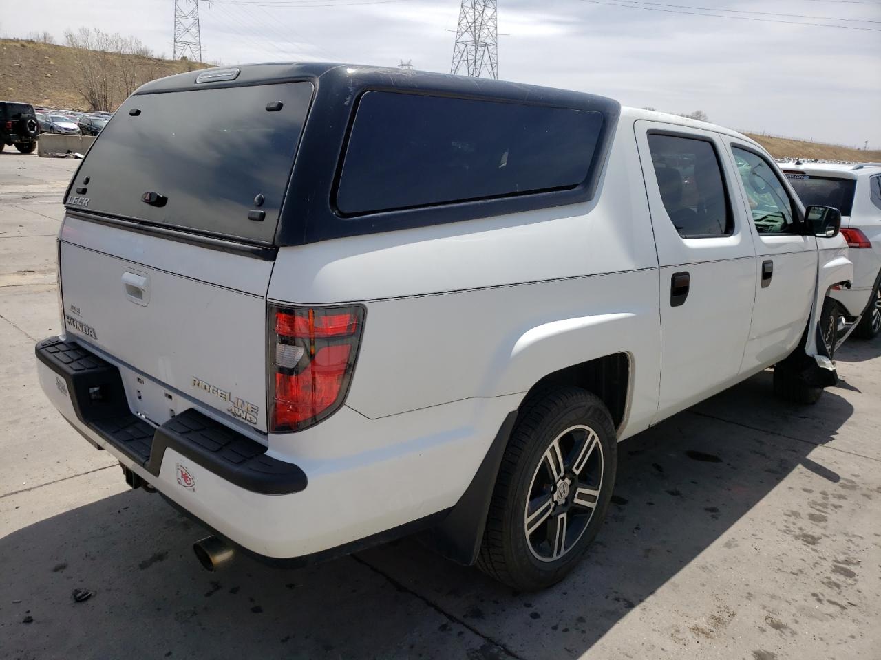 Photo 4 from auction – 2013 HONDA RIDGELINE with VIN 5FPYK1F78DB016775