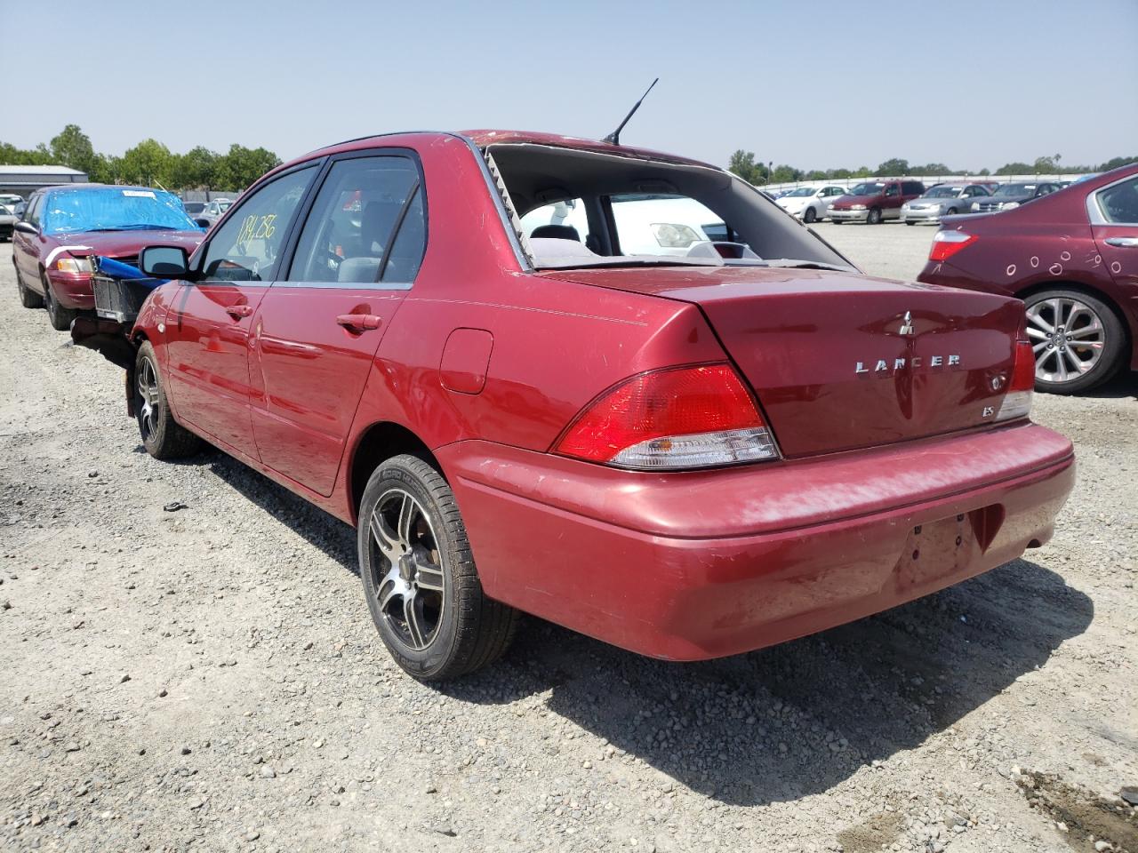 Photo 3 from auction – 2002 MITSUBISHI LANCER with VIN JA3AJ26E62U032087