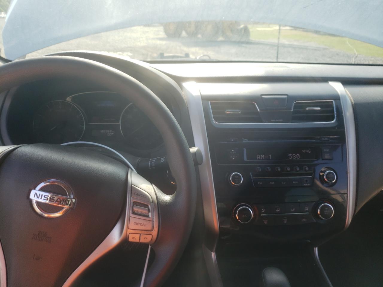 Photo 9 from auction – 2014 NISSAN ALTIMA 2.5 with VIN 1N4AL3AP0EC144703