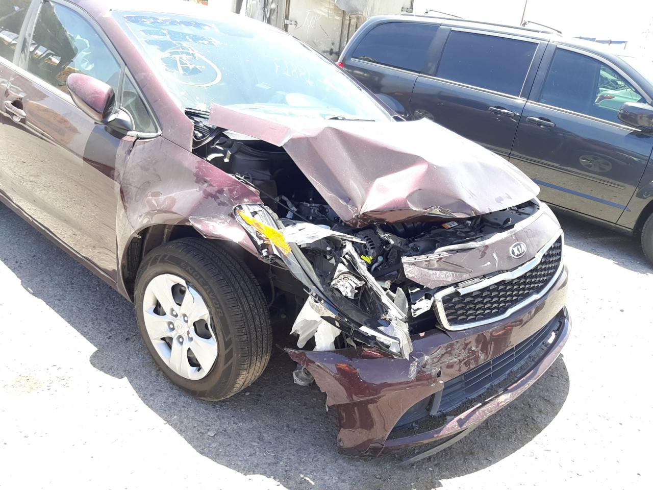 Photo 9 from auction – 2017 KIA FORTE LX with VIN 3KPFK4A76HE018383