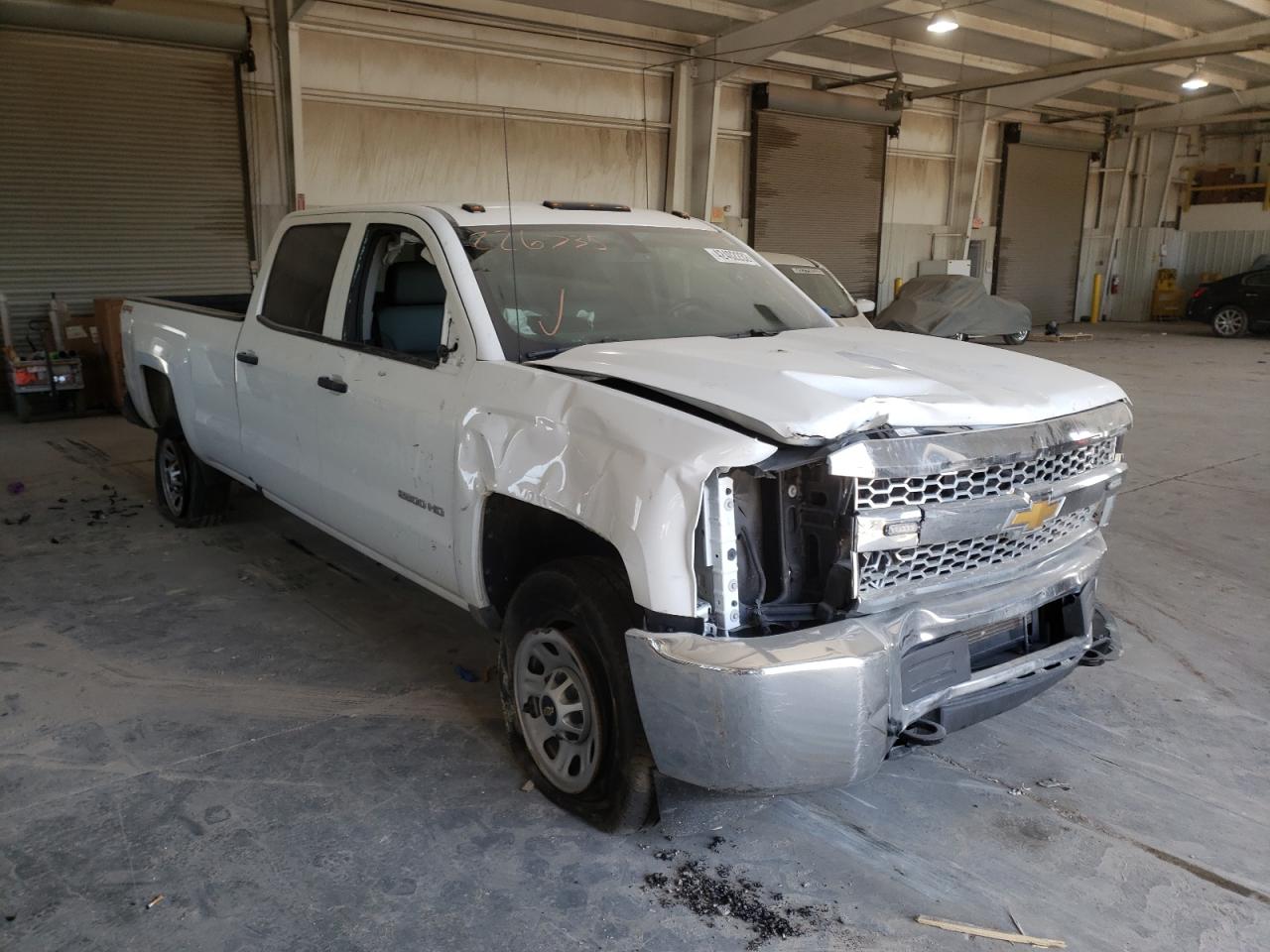CHEVROLET SILVERADO 2019 with VIN 1GC1KREG1KF226735 - Photo from auction