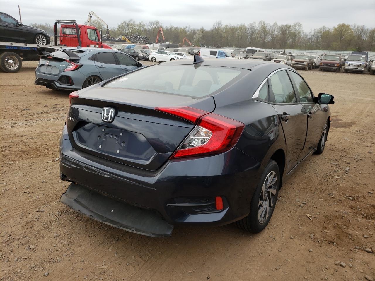 Photo 4 from auction – 2018 HONDA CIVIC EX with VIN 2HGFC2F75JH571693