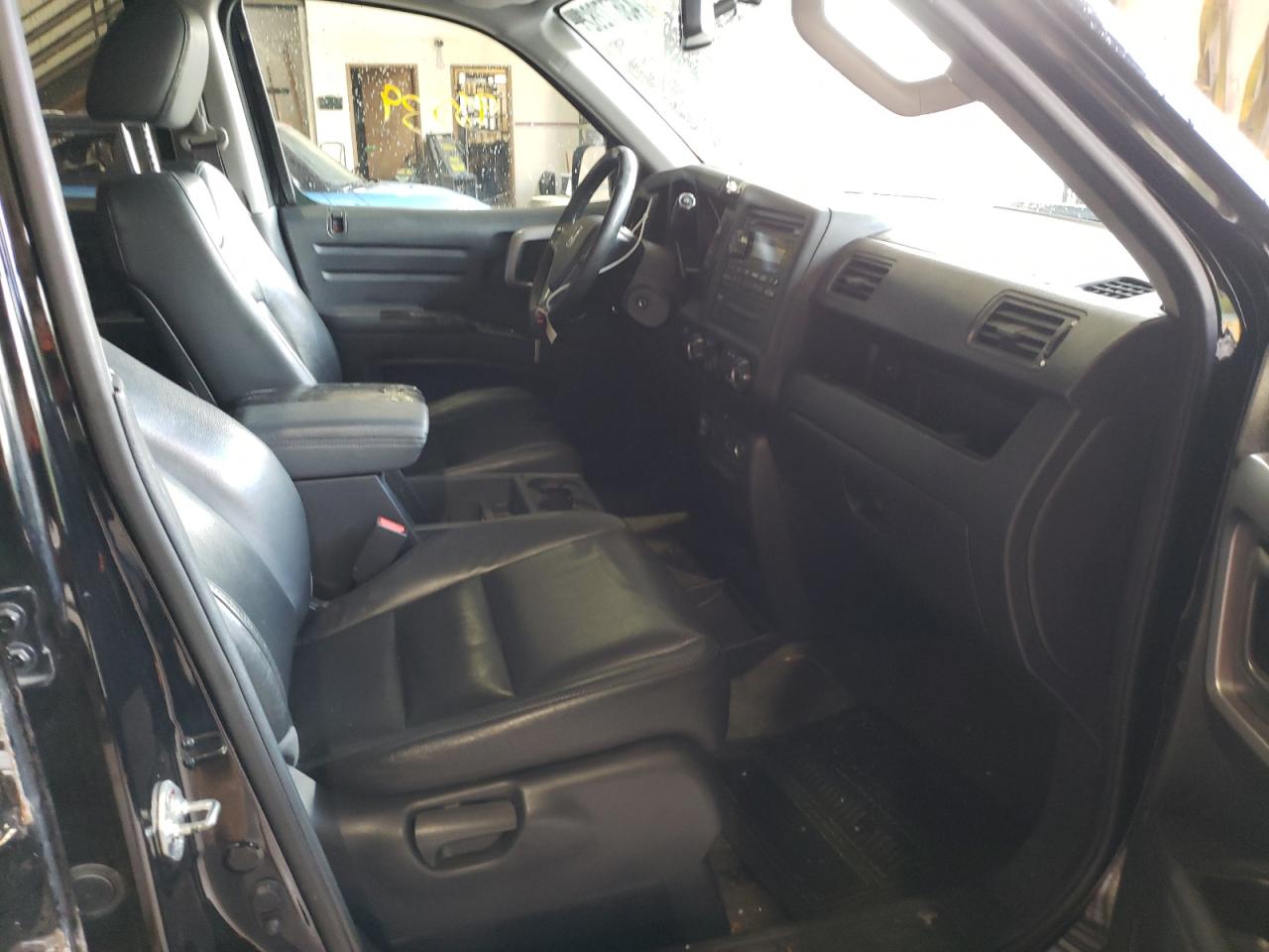 Photo 5 from auction – 2013 HONDA RIDGELINE with VIN 5FPYK1F51DB012842