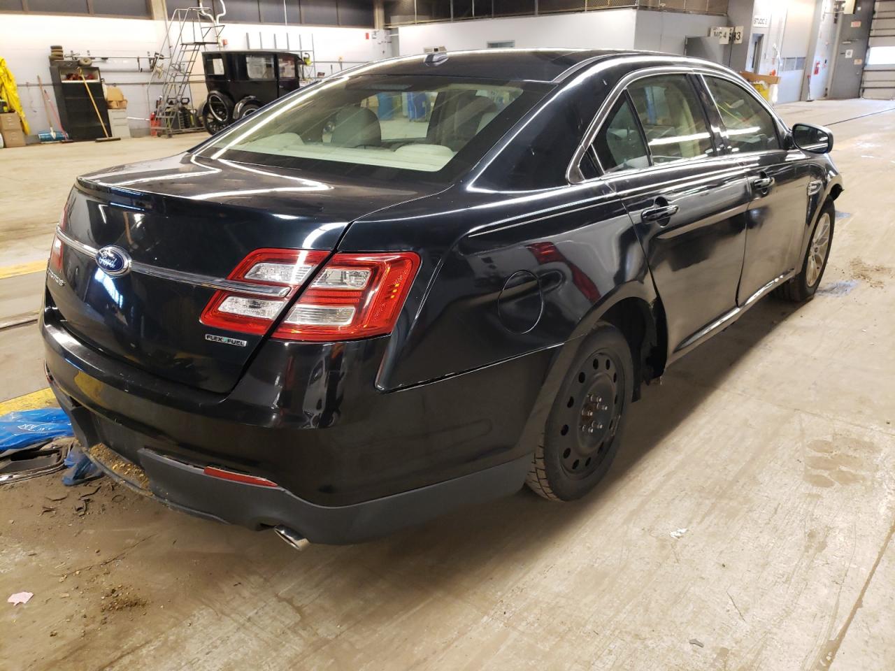 Photo 4 from auction – 2014 FORD TAURUS SE with VIN 1FAHP2D88EG125245