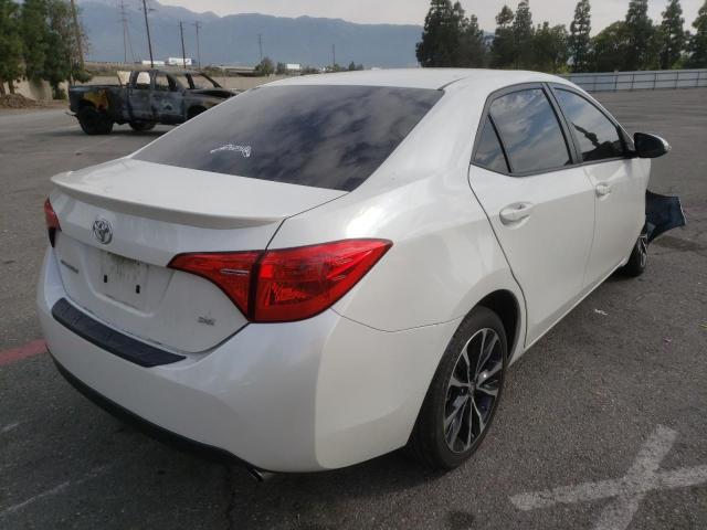 Photo 4 from auction – 2018 TOYOTA COROLLA L with VIN 5YFBURHEXJP802922