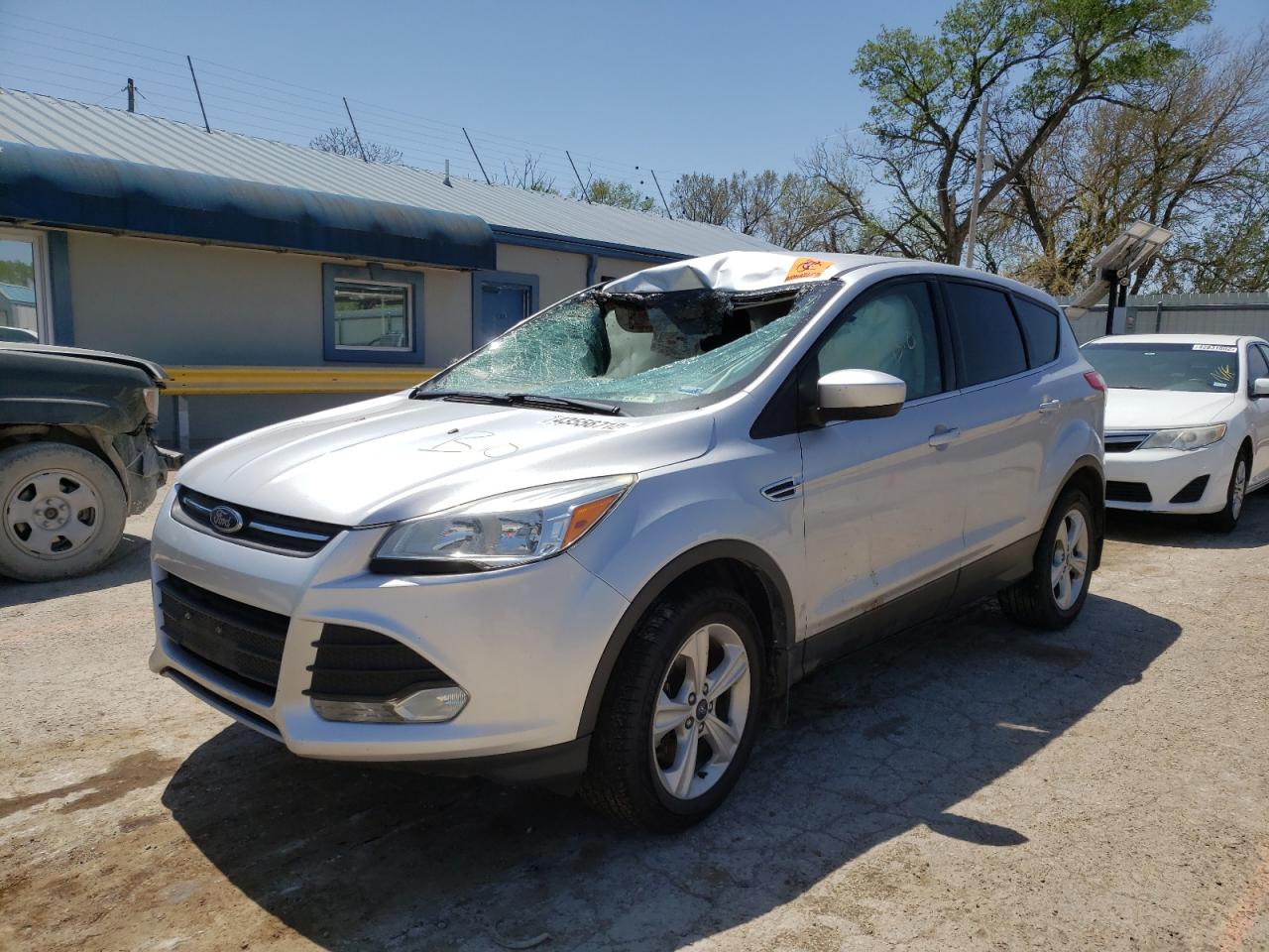 Photo 2 from auction – 2014 FORD ESCAPE SE with VIN 1FMCU9G97EUE39475