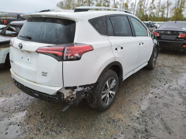 Photo 4 from auction – 2016 TOYOTA RAV4 XLE with VIN 2T3RFREVXGW490208