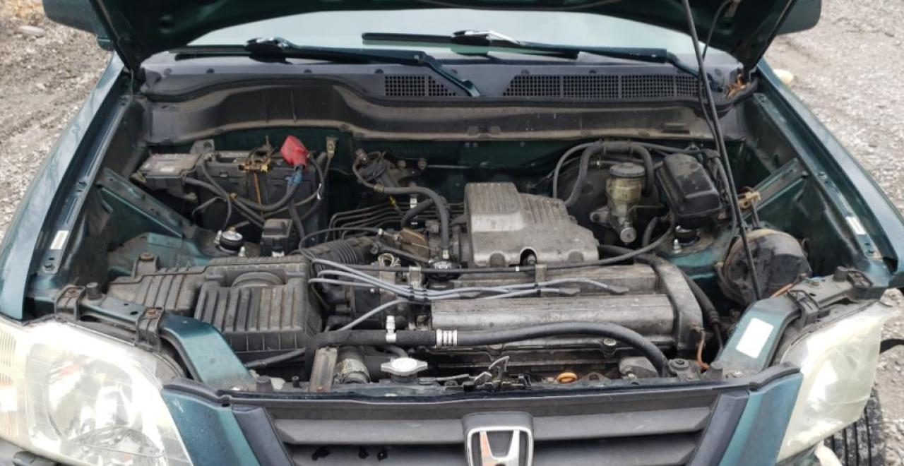 Photo 7 from auction – 1999 HONDA CR-V EX with VIN JHLRD1863XC051031