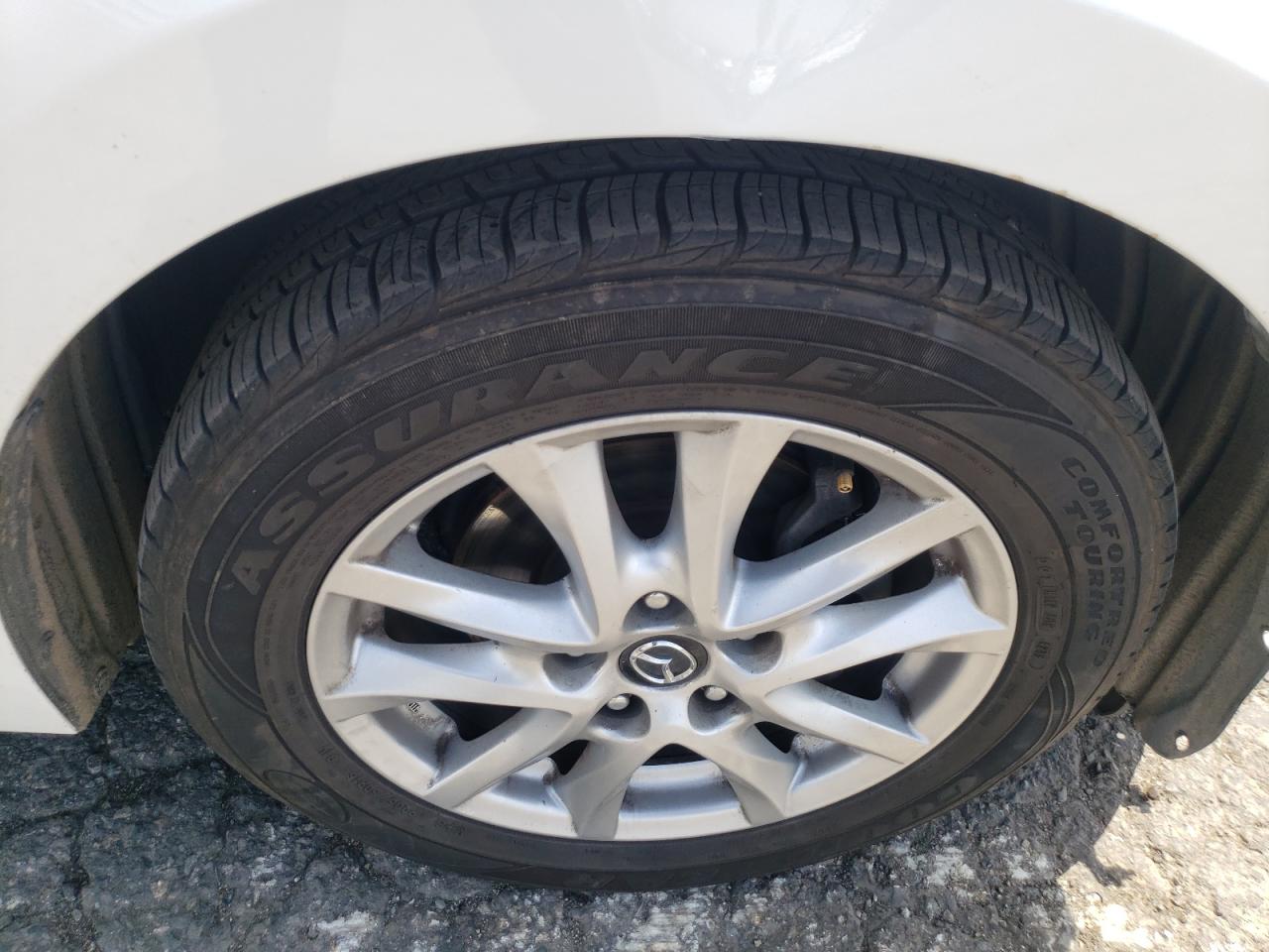 Photo 9 from auction – 2014 MAZDA 3 TOURING with VIN JM1BM1V70E1130788