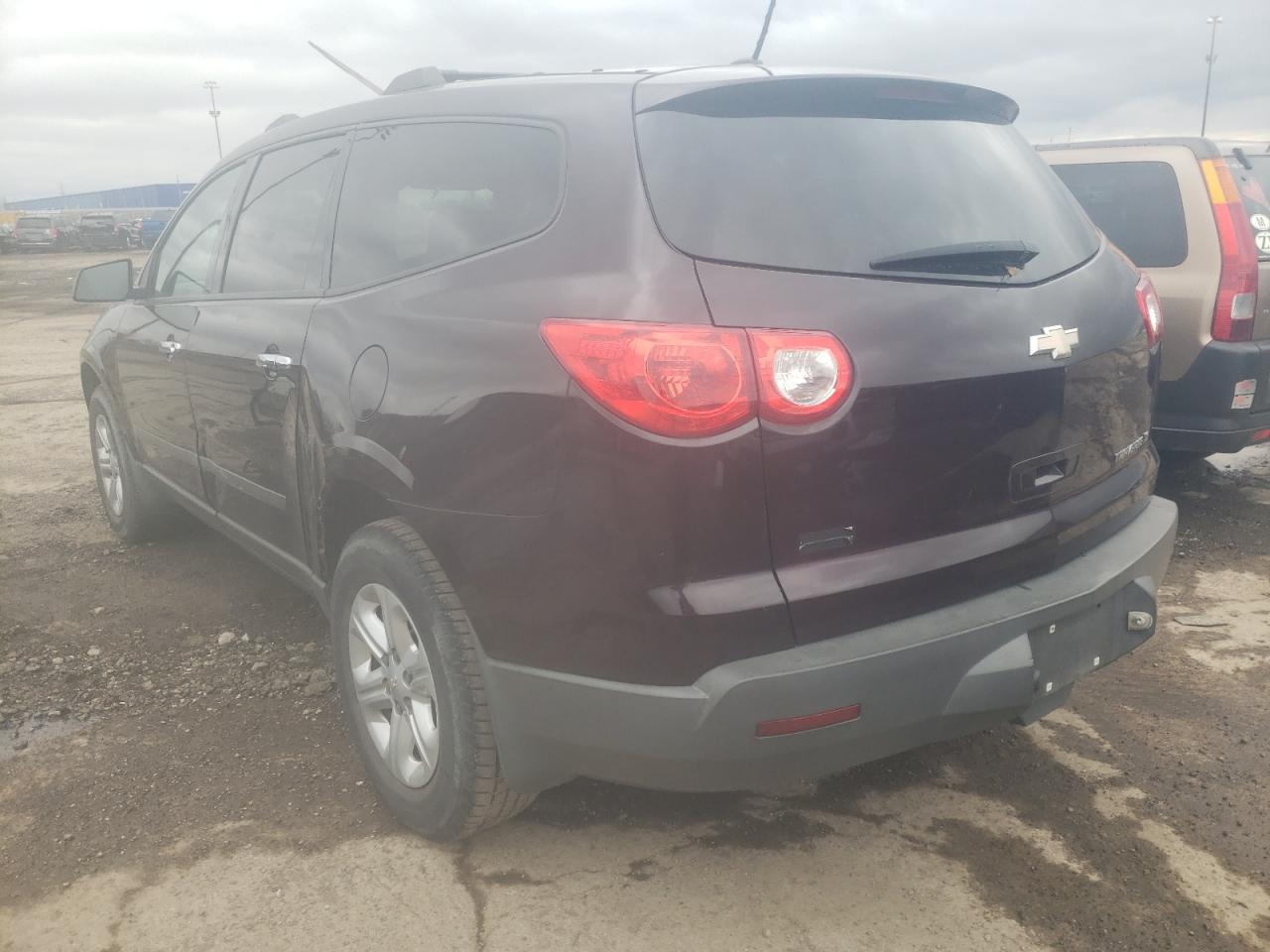 Photo 3 from auction – 2010 CHEVROLET TRAVERSE L with VIN 1GNLREED4AS154199
