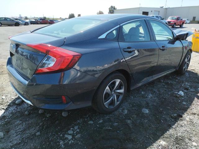 Photo 4 from auction – 2019 HONDA CIVIC LX with VIN 2HGFC2F63KH573564