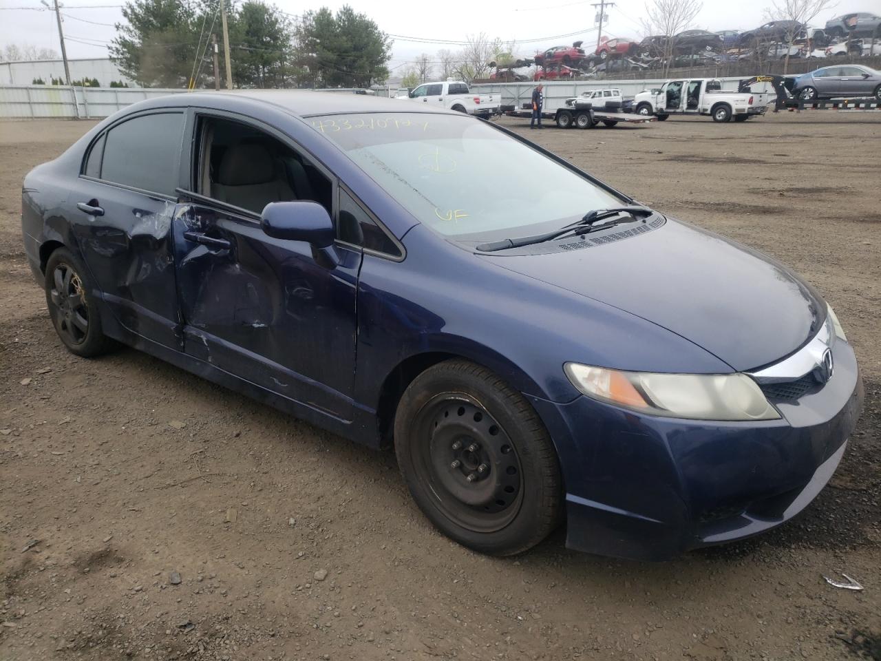 HONDA CIVIC LX 2011 with VIN 2HGFA1F5XBH544828 - Photo from auction