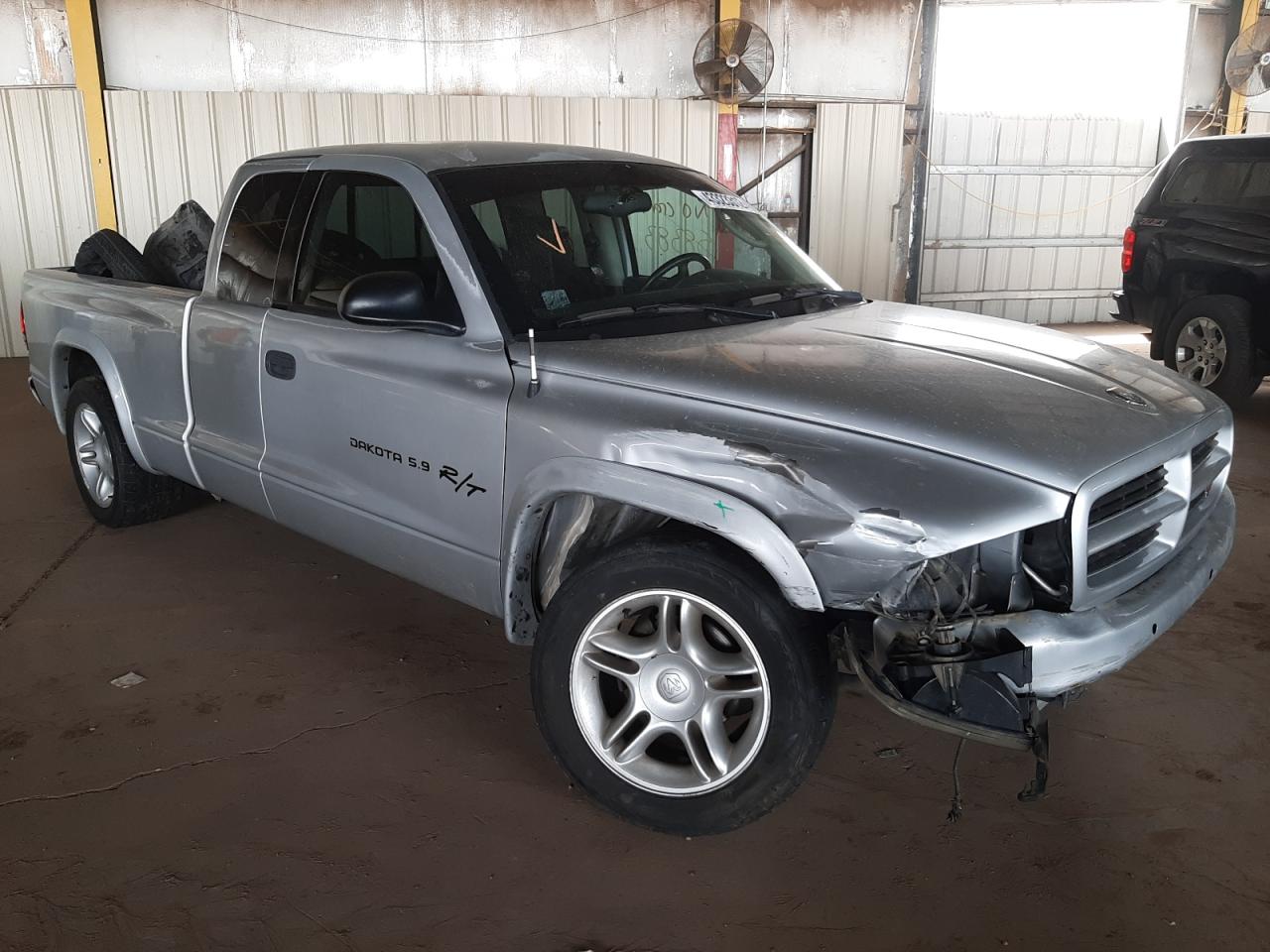 DODGE DAKOTA 2001 with VIN 1B7GL22Z71S114922 - Photo from auction