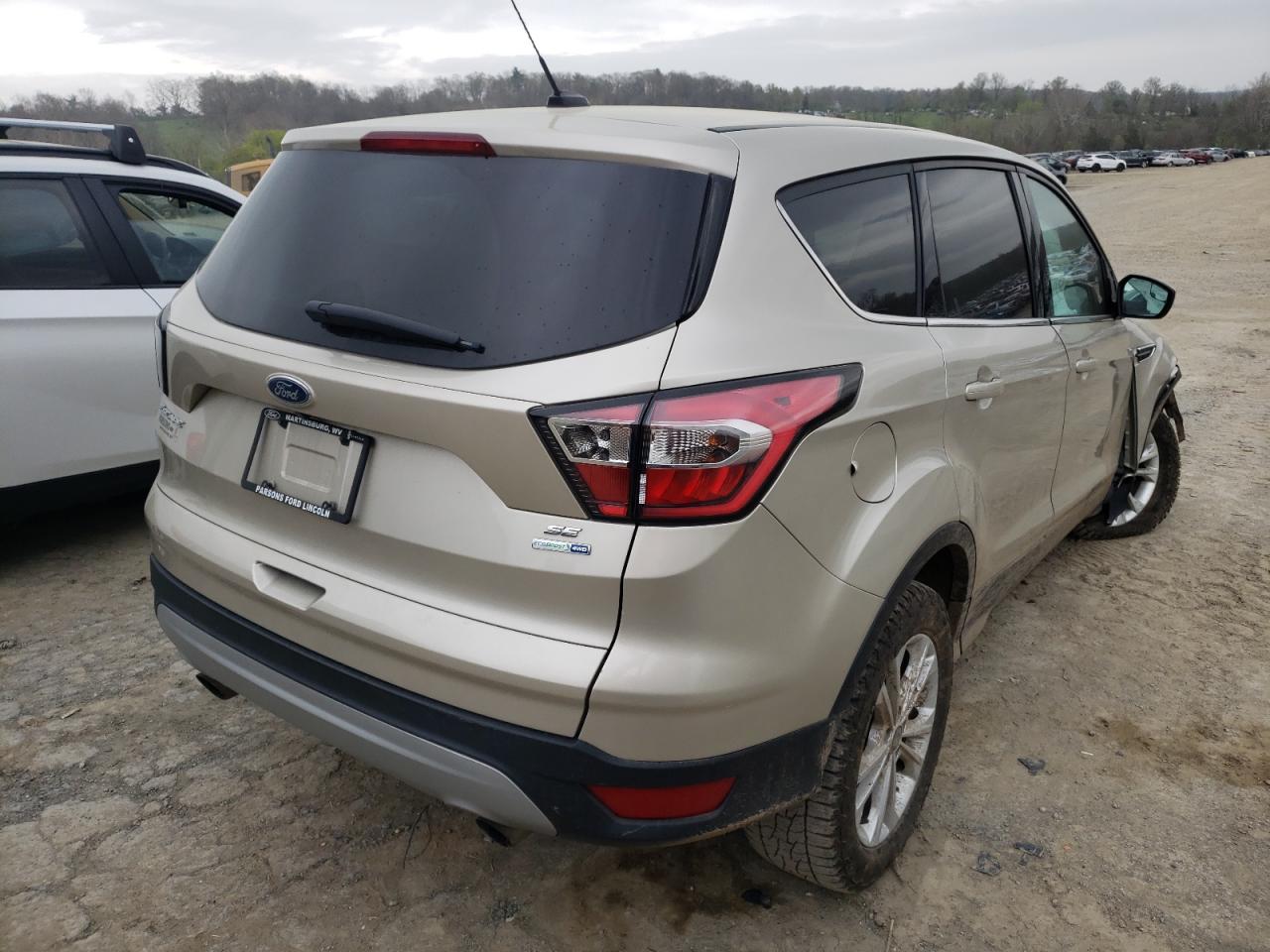 Photo 4 from auction – 2017 FORD ESCAPE SE with VIN 1FMCU9GD7HUB75893