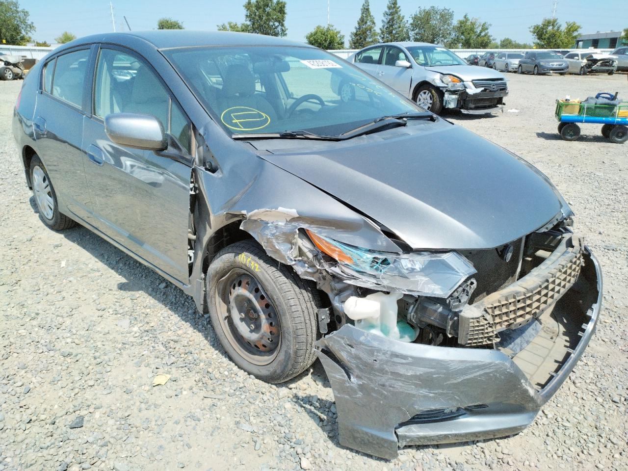 Photo 9 from auction – 2011 HONDA INSIGHT LX with VIN JHMZE2H56BS002586