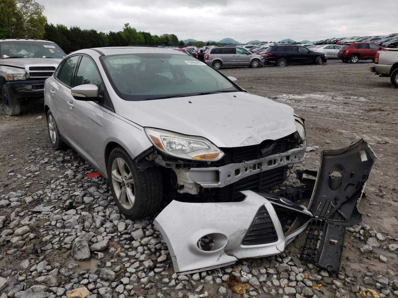 FORD FOCUS SE 2014 with VIN 1FADP3F24EL367793 - Photo from auction