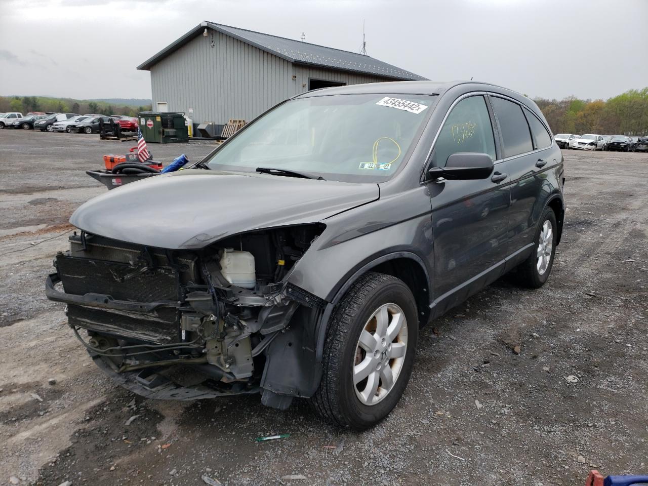 Photo 2 from auction – 2011 HONDA CR-V SE with VIN 5J6RE4H42BL094174