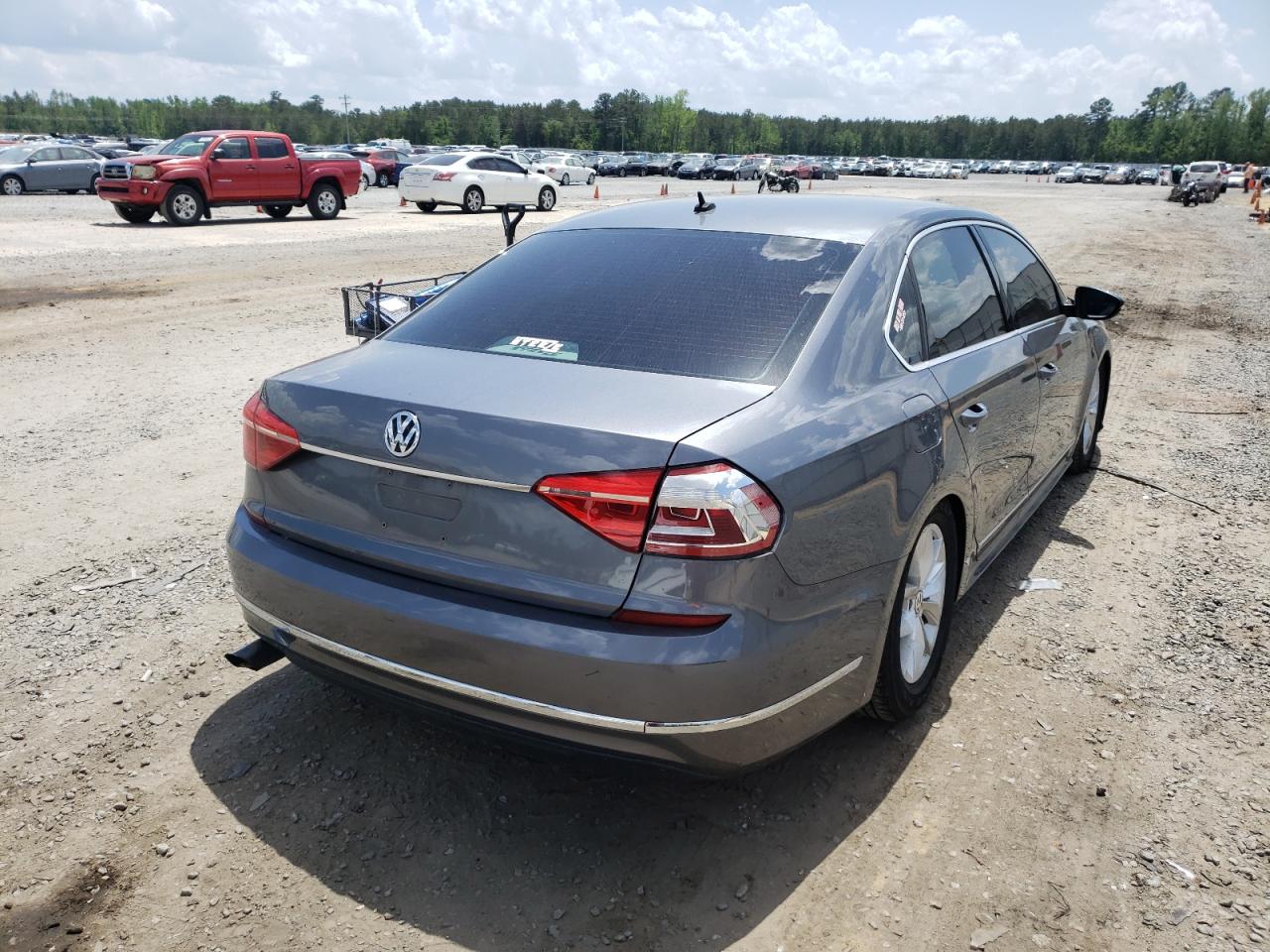 Photo 4 from auction – 2016 VOLKSWAGEN PASSAT S with VIN 1VWAT7A32GC040129