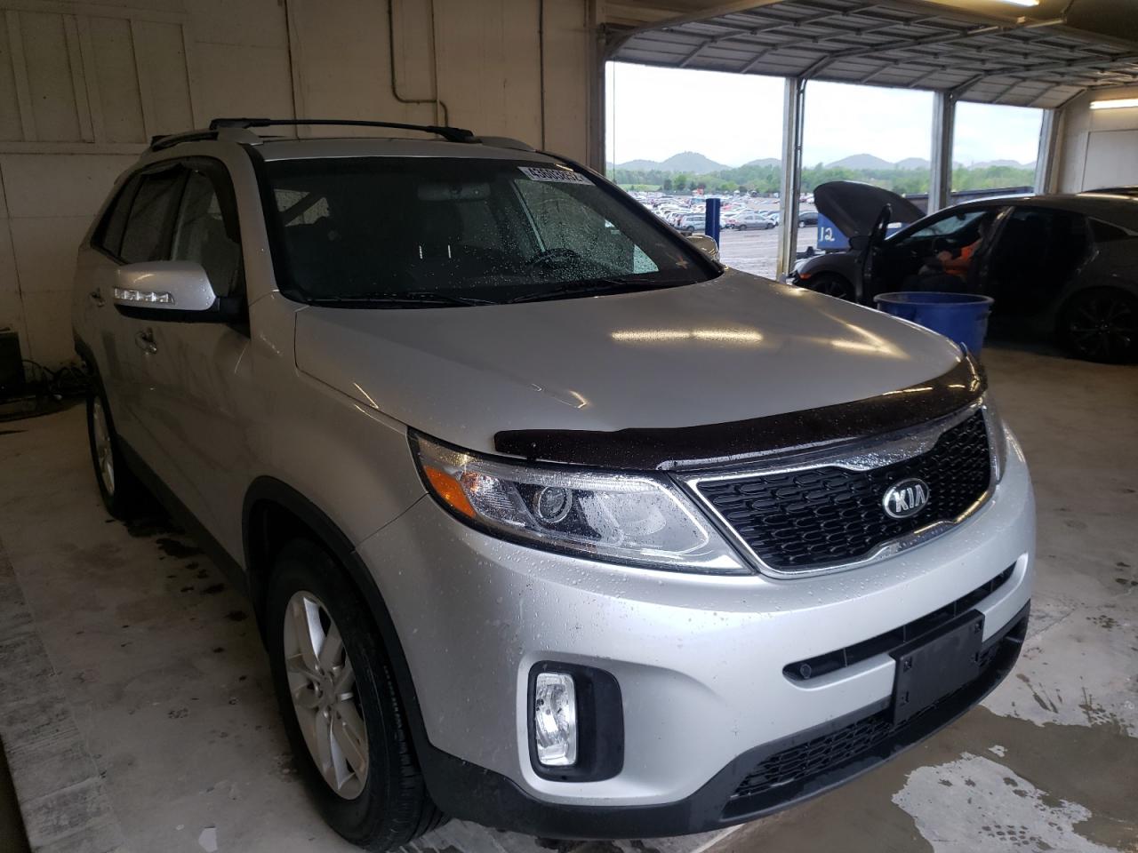 KIA SORENTO LX 2014 with VIN 5XYKT4A61EG438005 - Photo from auction