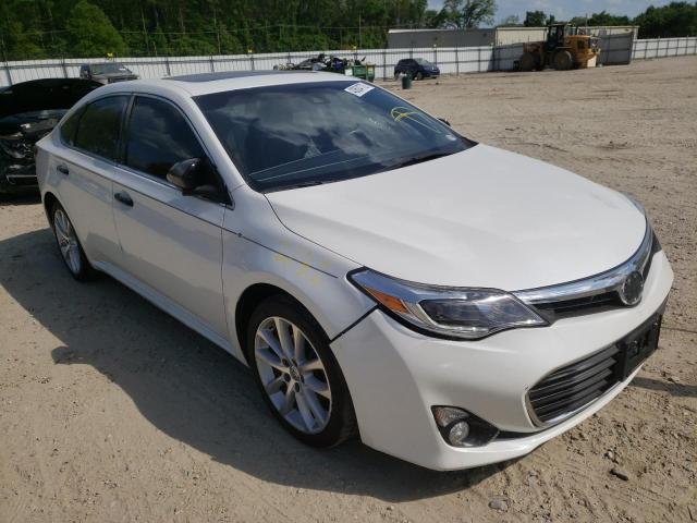 TOYOTA AVALON 2014 with VIN 4T1BK1EB9EU127733 - Photo from auction