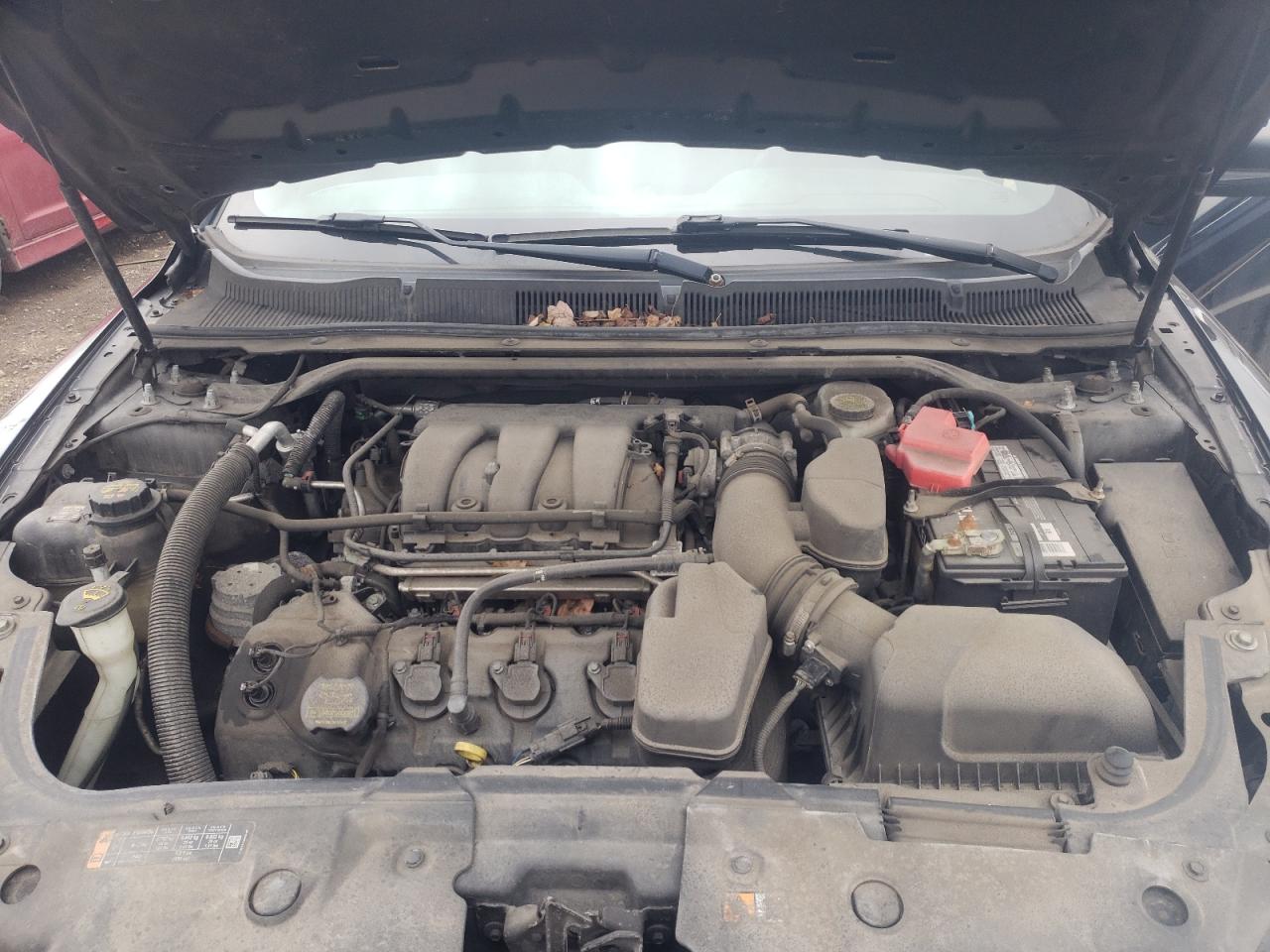 Photo 7 from auction – 2014 FORD TAURUS SEL with VIN 1FAHP2E89EG129030