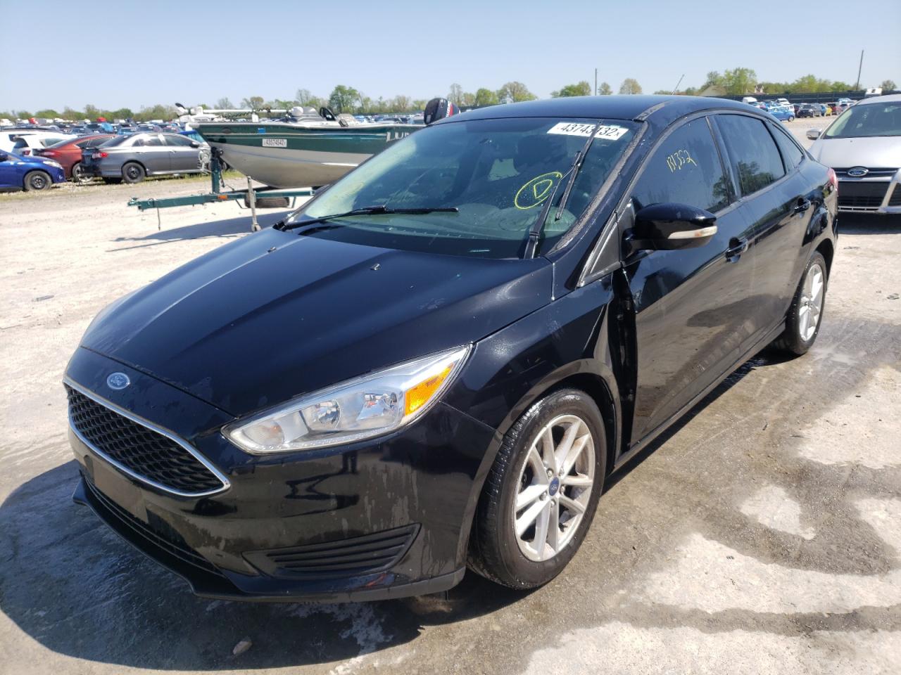 Photo 2 from auction – 2016 FORD FOCUS SE with VIN 1FADP3F22GL264603