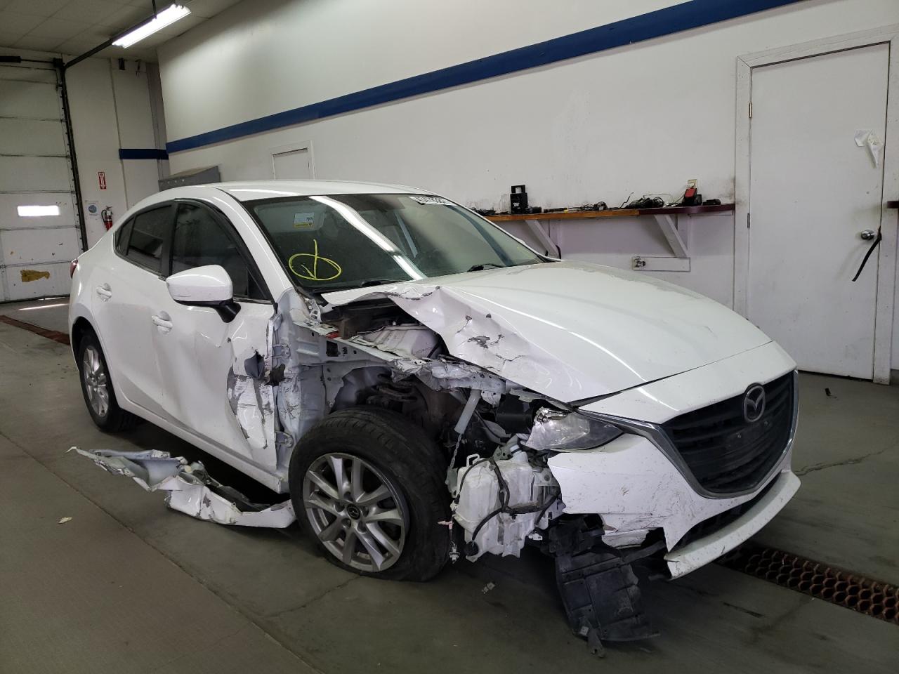 MAZDA 3 TOURING 2014 with VIN JM1BM1V72E1180415 - Photo from auction