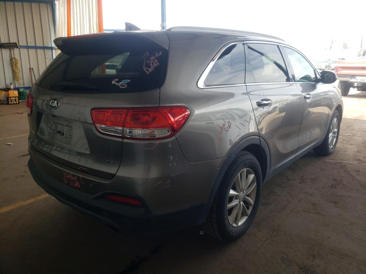Photo 4 from auction – 2016 KIA SORENTO LX with VIN 5XYPG4A59GG014303