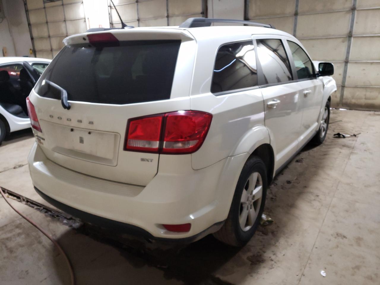 Photo 4 from auction – 2012 DODGE JOURNEY SX with VIN 3C4PDDBG4CT297477