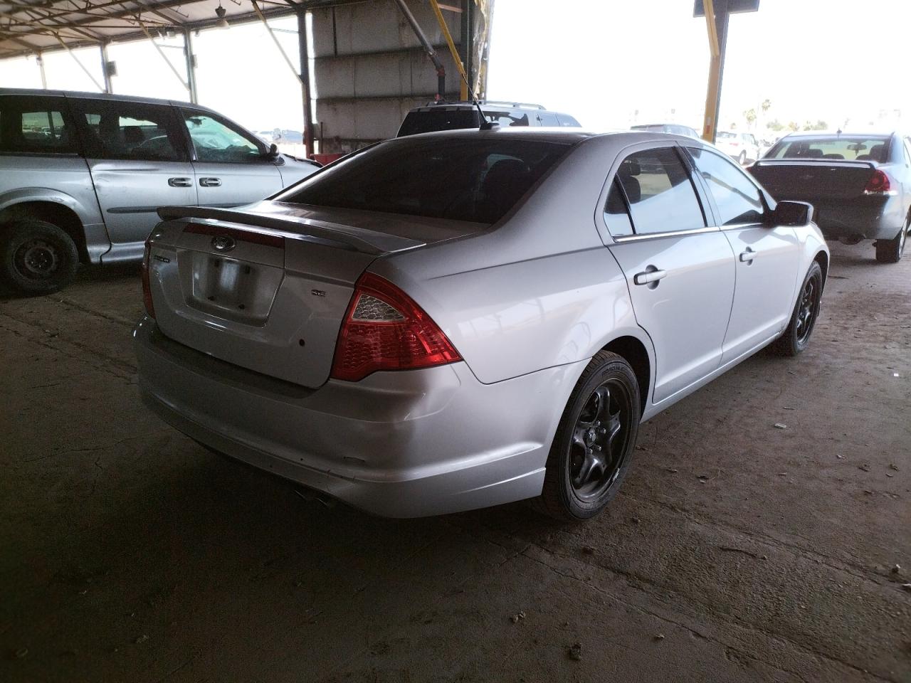 Photo 4 from auction – 2011 FORD FUSION SE with VIN 3FAHP0HA0BR128453