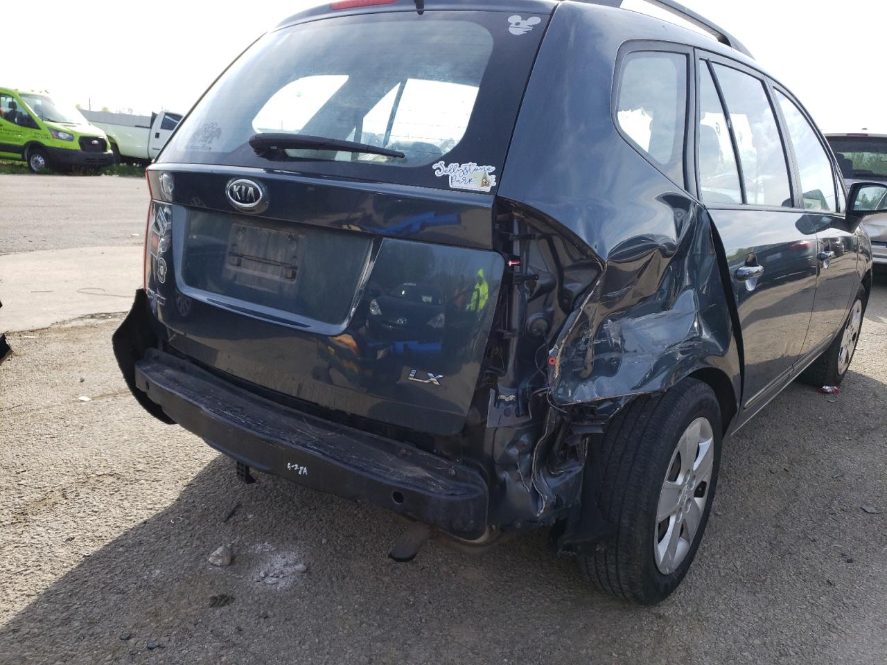 Photo 9 from auction – 2009 KIA RONDO BASE with VIN KNAFG528997222365