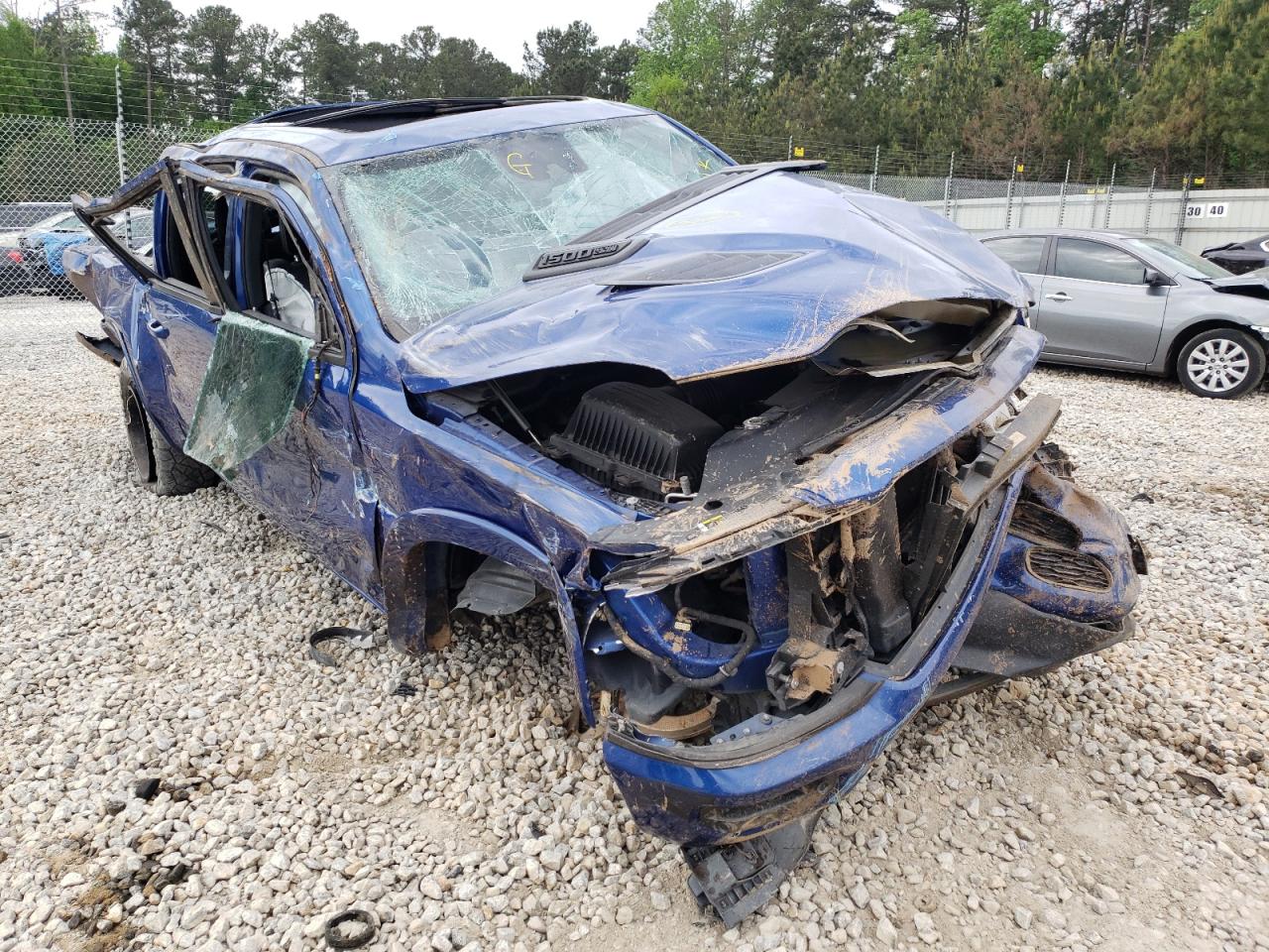 RAM 1500 LARAM 2019 with VIN 1C6SRFJTXKN630907 - Photo from auction