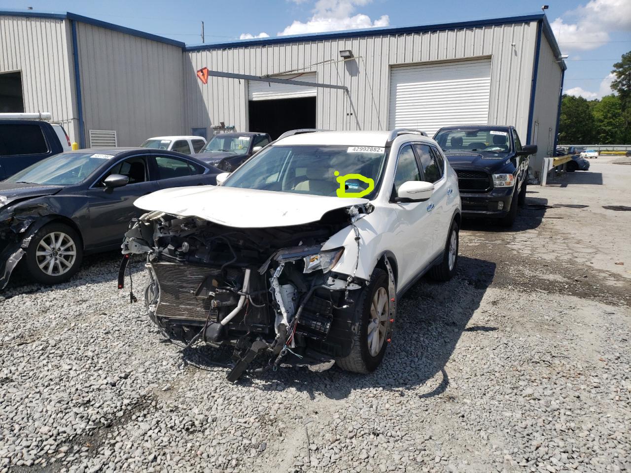 Photo 2 from auction – 2014 NISSAN ROGUE S with VIN 5N1AT2MT3EC830792