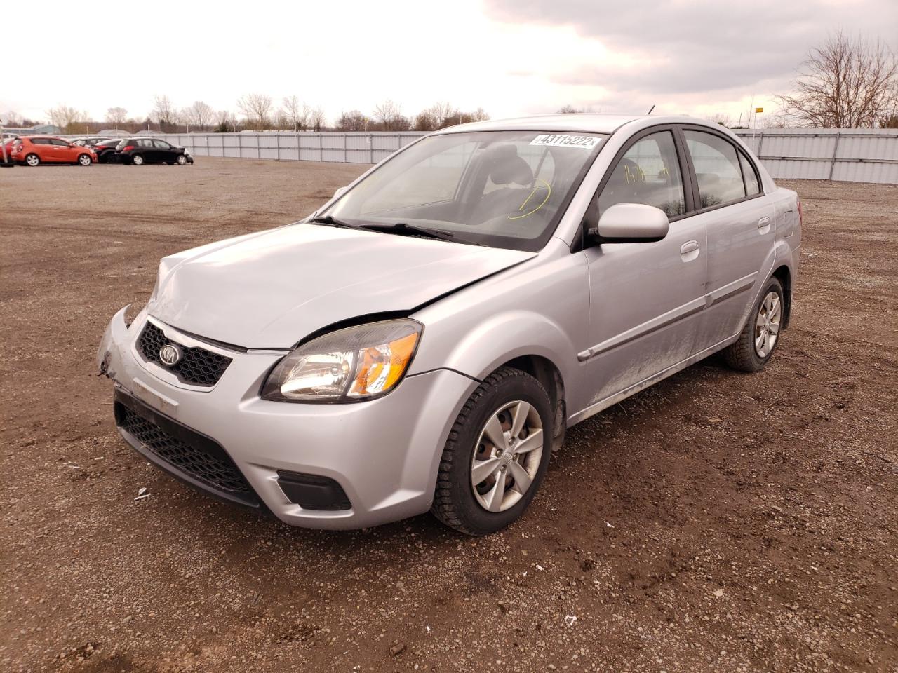 Photo 2 from auction – 2011 KIA RIO BASE with VIN KNADH4B33B6952142