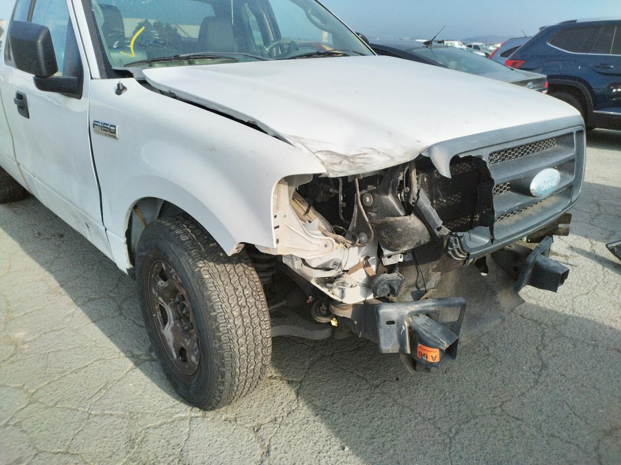 Photo 9 from auction – 2006 FORD F150 with VIN 1FTRF122X6NB85101