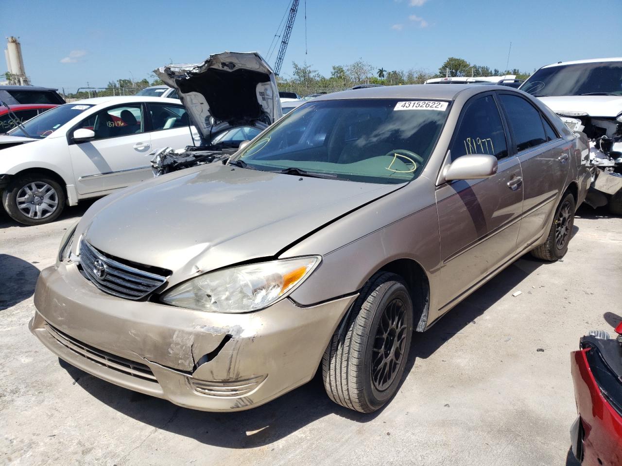 Photo 2 from auction – 2002 TOYOTA CAMRY LE with VIN JTDBE32K720013034