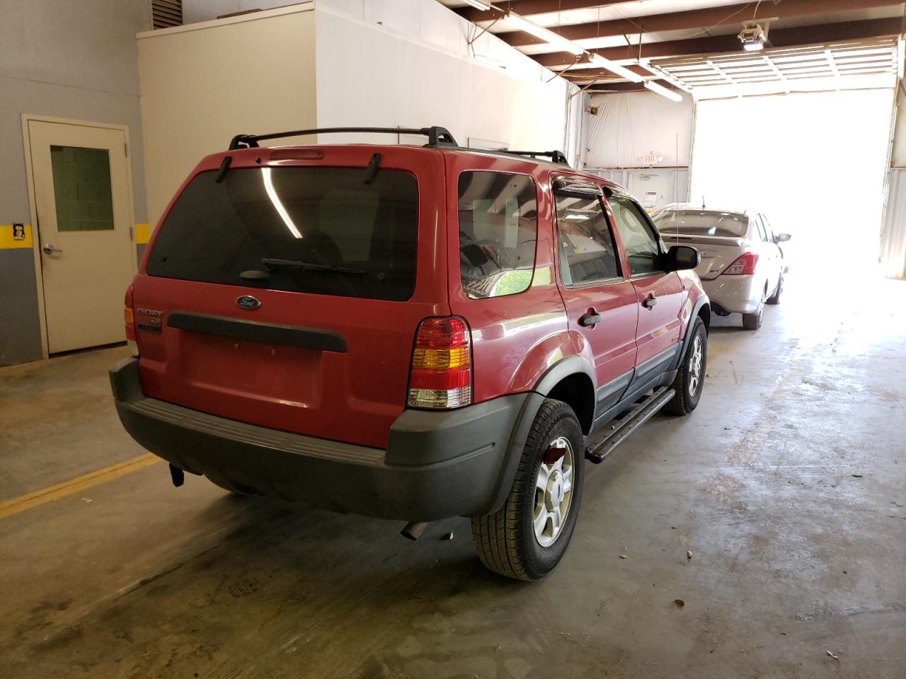 Photo 4 from auction – 2002 FORD ESCAPE XLT with VIN 1FMYU031X2KB14747