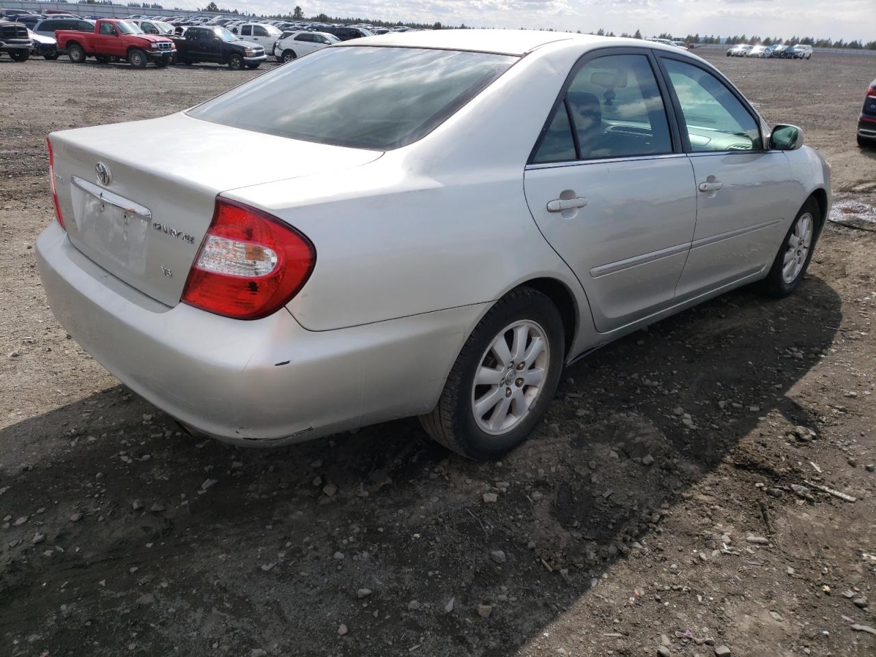 Photo 4 from auction – 2002 TOYOTA CAMRY LE with VIN 4T1BF30K92U001584