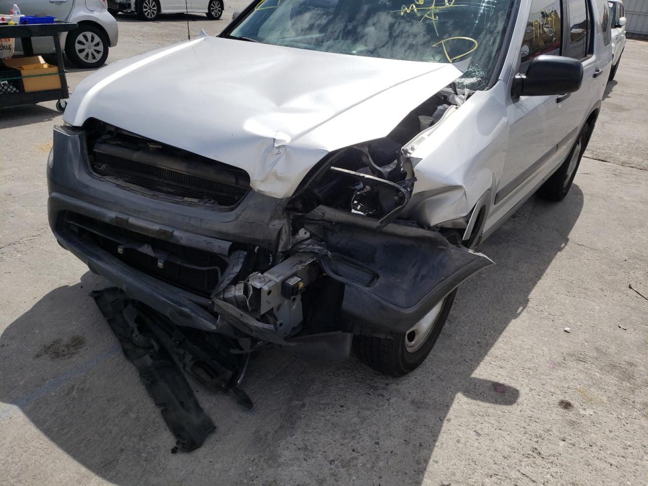 Photo 9 from auction – 2003 HONDA CR-V LX with VIN JHLRD68443C006914