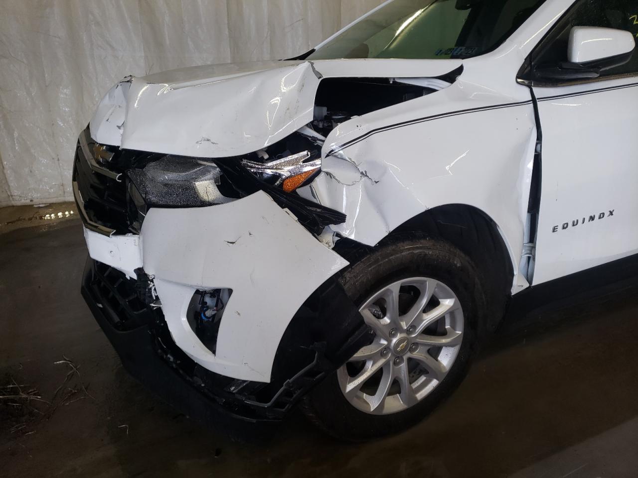 Photo 9 from auction – 2018 CHEVROLET EQUINOX LT with VIN 3GNAXSEV3JS620620