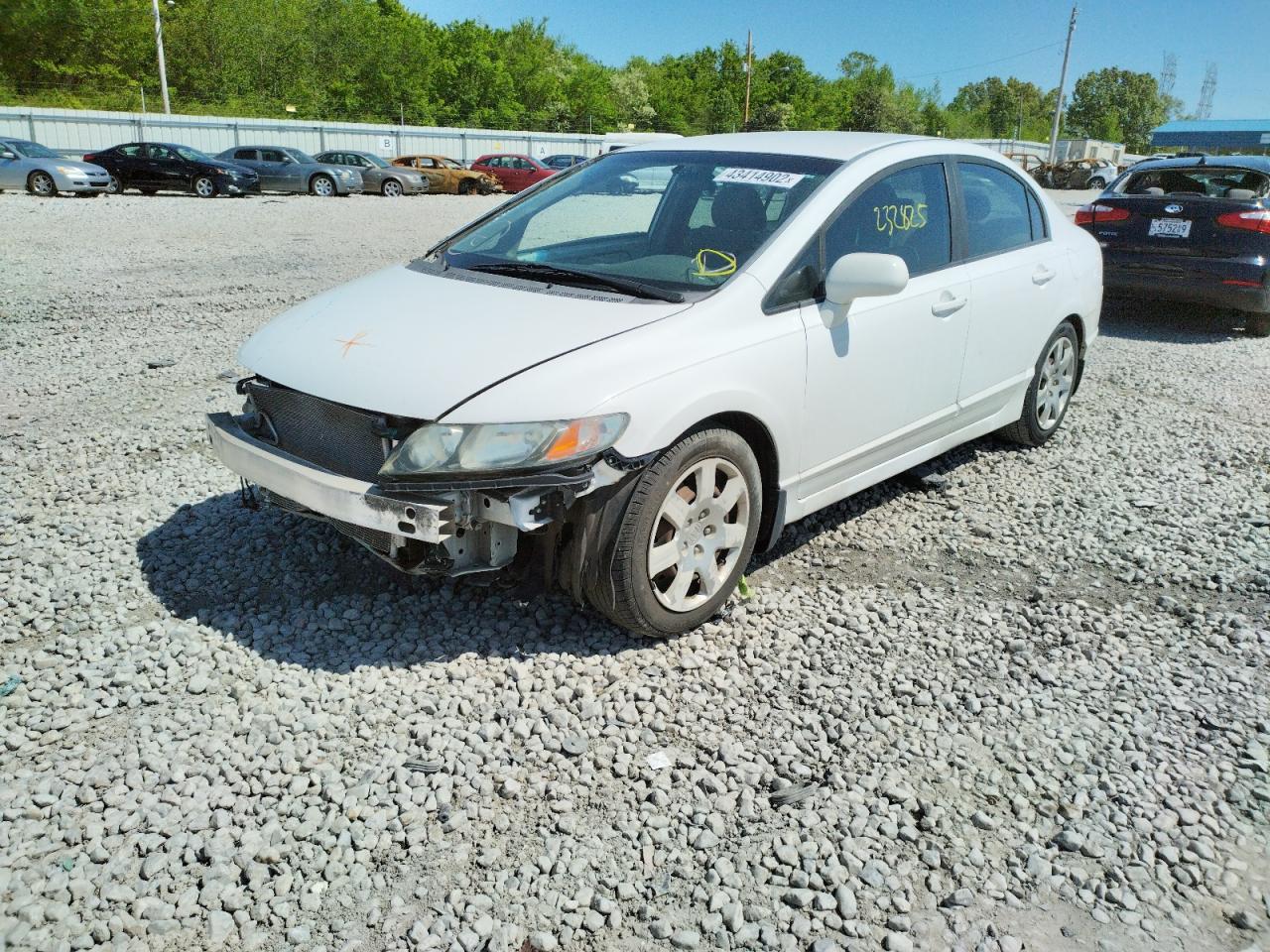 Photo 15 from auction – 2011 HONDA CIVIC LX with VIN 19XFA1F57BE032504