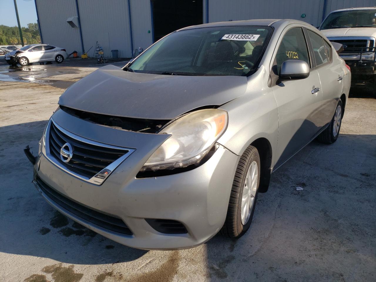 Photo 2 from auction – 2012 NISSAN VERSA S with VIN 3N1CN7AP2CL927286