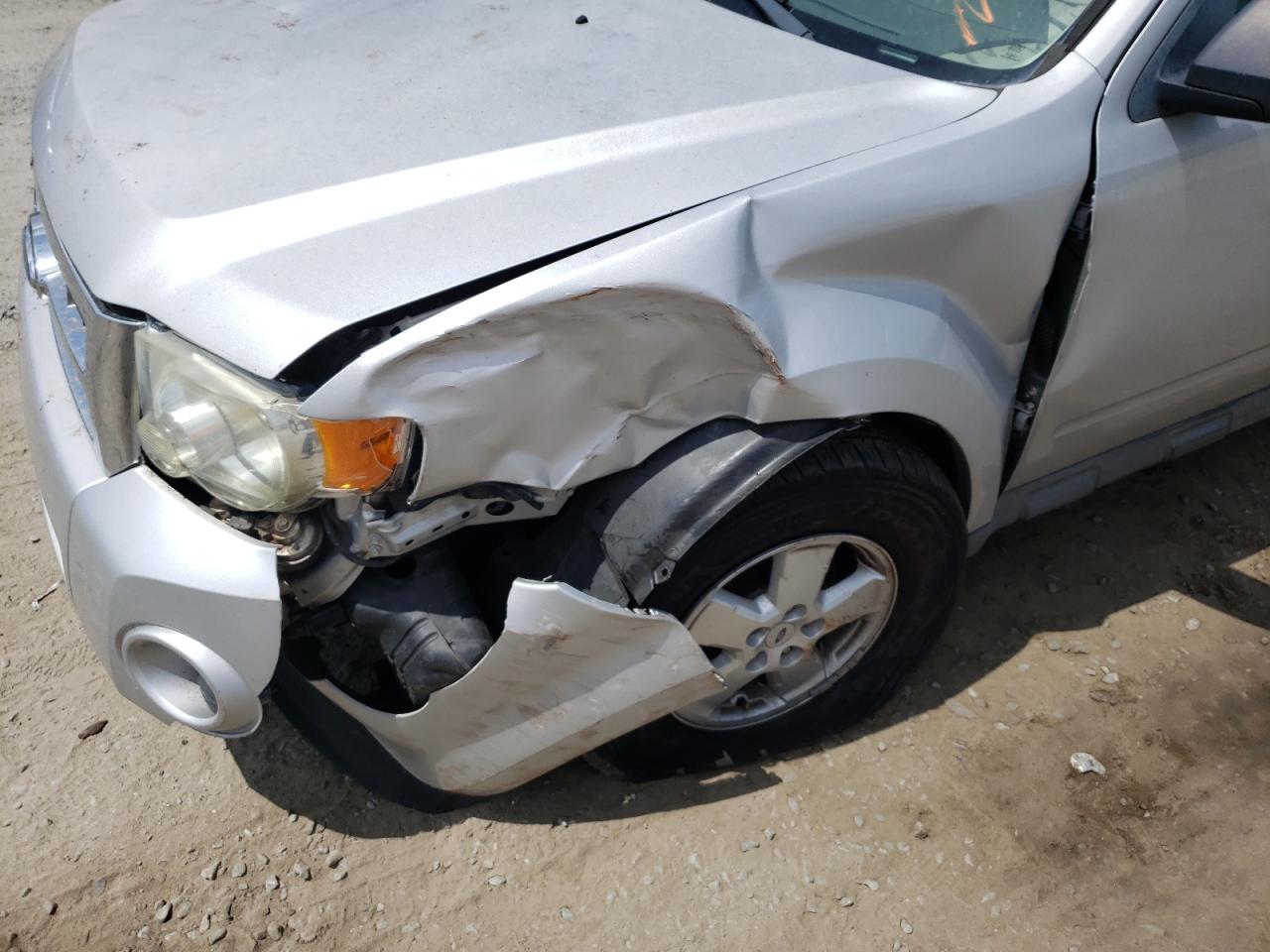 Photo 9 from auction – 2009 FORD ESCAPE XLS with VIN 1FMCU02779KB21973