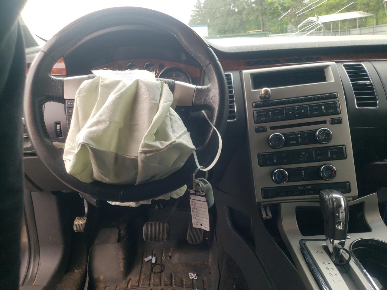 Photo 9 from auction – 2009 FORD FLEX LIMIT with VIN 2FMDK53C89BA02844