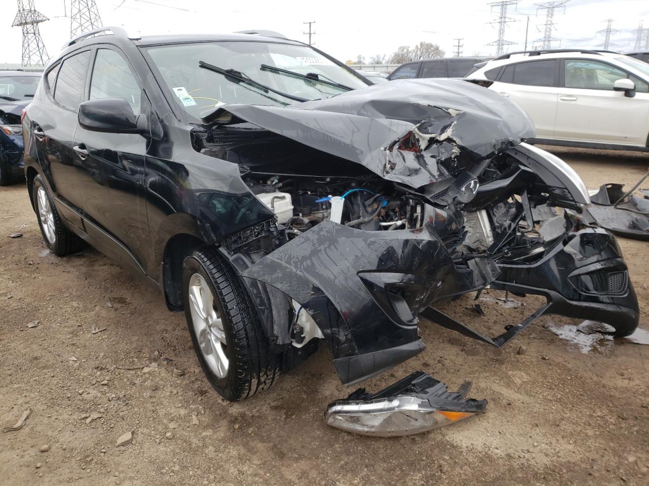 Photo 1 from auction – 2011 HYUNDAI TUCSON GLS with VIN KM8JUCAC1BU316257