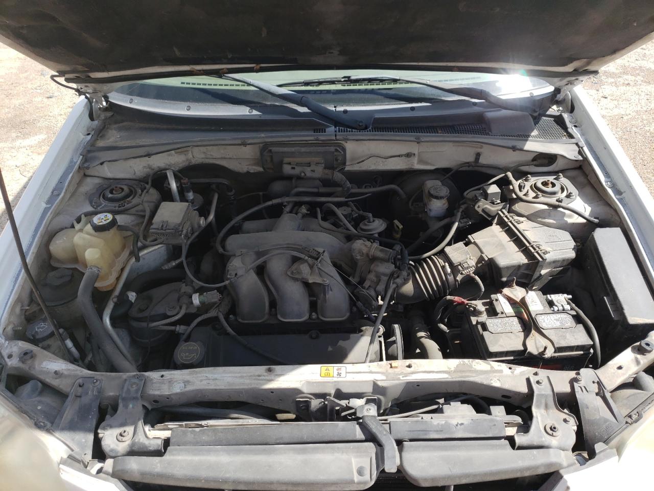 Photo 7 from auction – 2002 MAZDA TRIBUTE LX with VIN 4F2YU09162KM64226