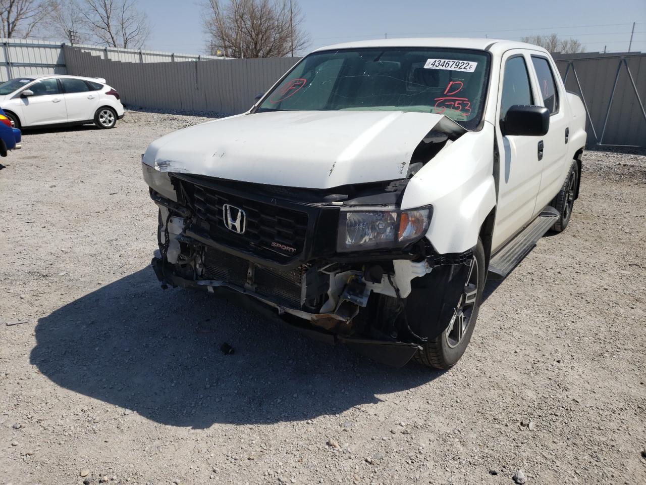 Photo 9 from auction – 2013 HONDA RIDGELINE with VIN 5FPYK1F79DB016753