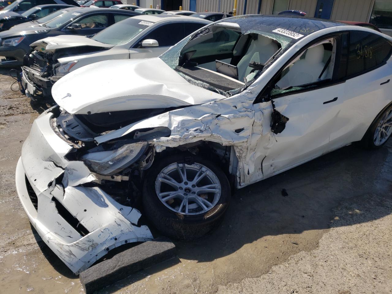 Photo 9 from auction – 2021 TESLA MODEL Y with VIN 5YJYGDEE4MF189950