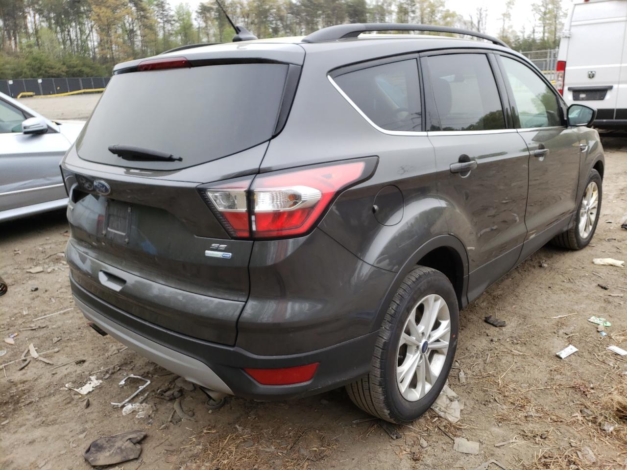 Photo 4 from auction – 2018 FORD ESCAPE SE with VIN 1FMCU9GD2JUC74952