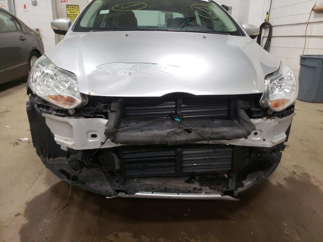 Photo 9 from auction – 2013 FORD FOCUS SE with VIN 1FADP3F24DL274447